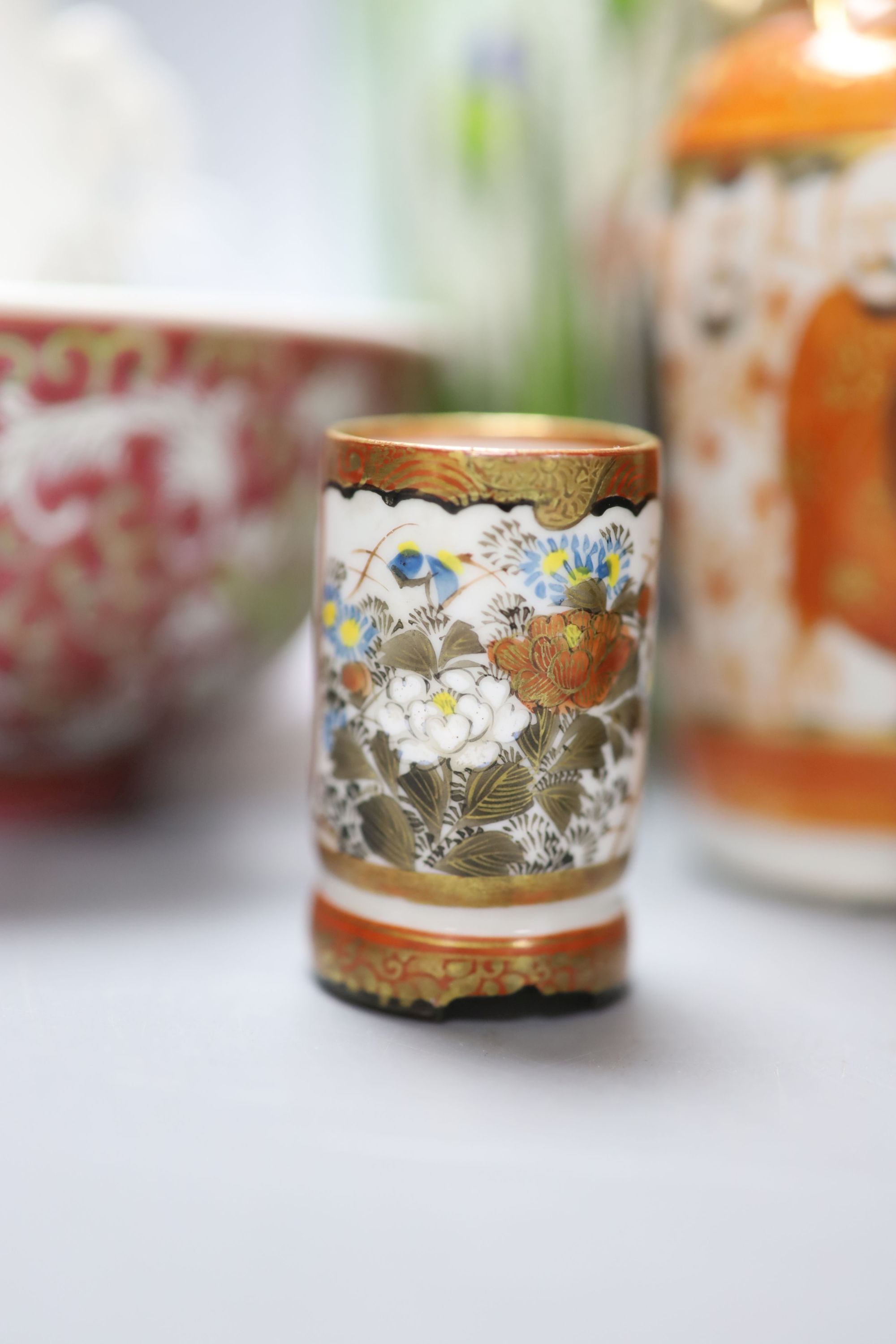 A group of Chinese and Japanese ceramics and three cloisonne enamel vases